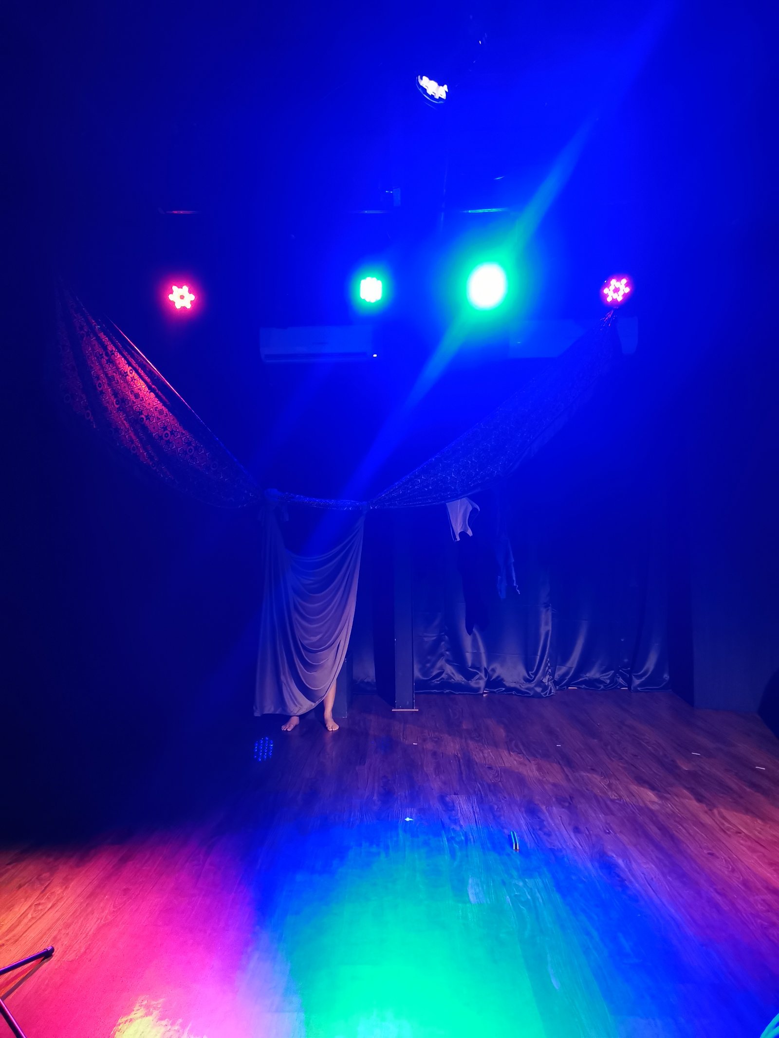 Low-lit performance on a black box stage