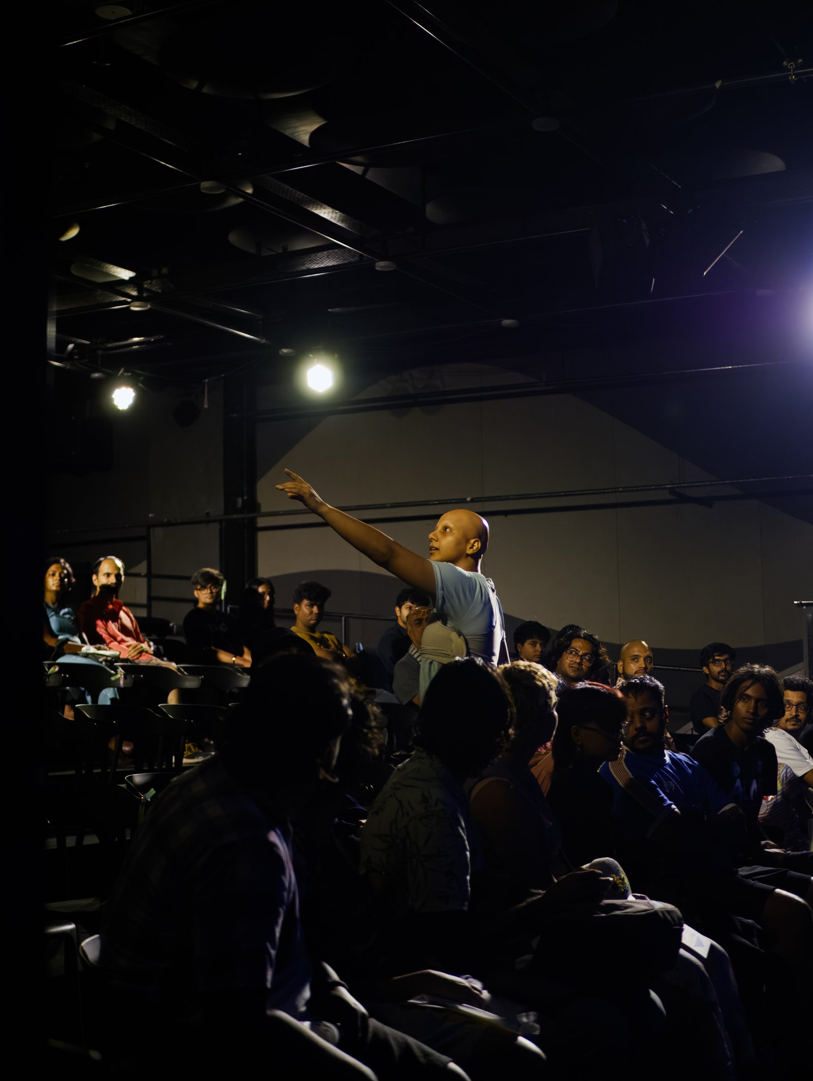 Audience surrounding a performer